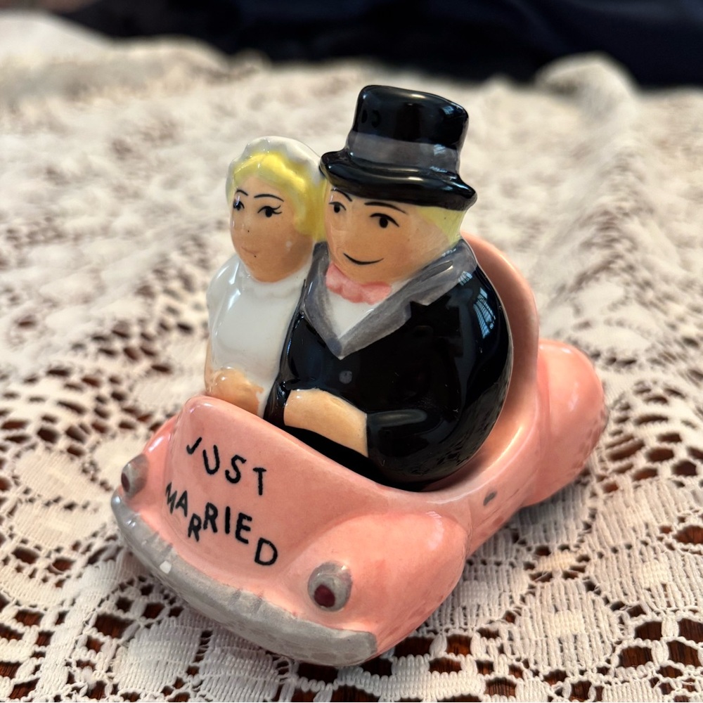 Bride and Groom Figurines in Pink Car